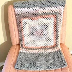 Crocheted Baby/Toddler Blanket.Size 39 x 38.5 Color mixture of browns/pinks/gray